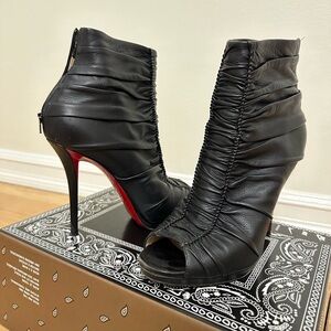 CHRISTIAN LOUBOUTIN
Leather Sock Boots
